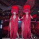 Professional event greeters welcoming guests at a Miami corporate event